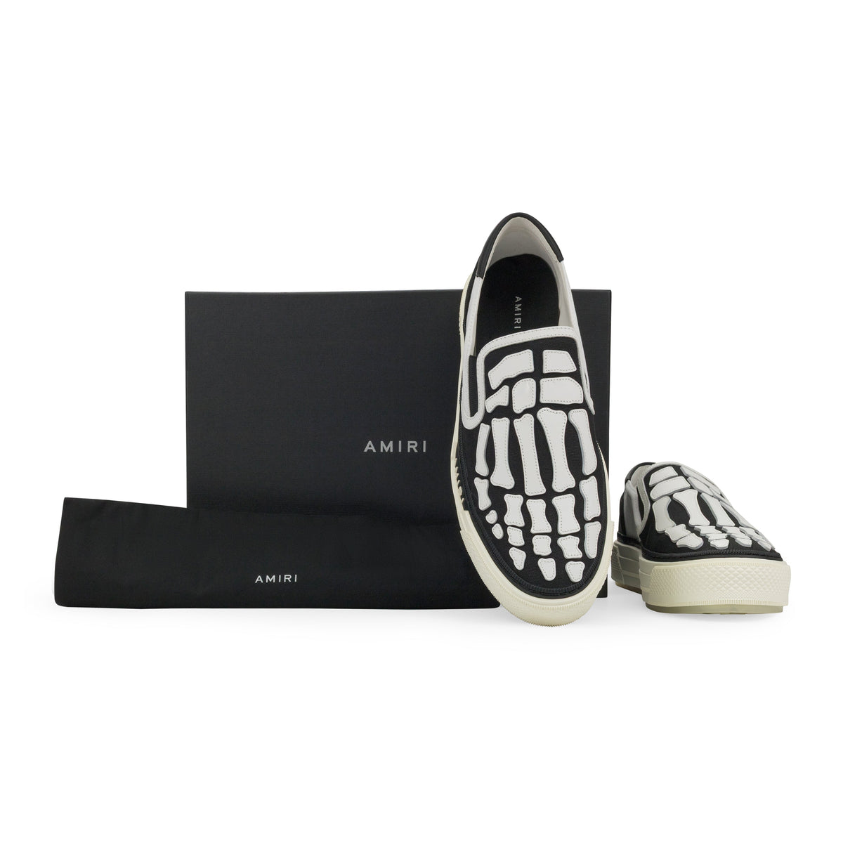 White/Black Skel Top Slip On Sneakers